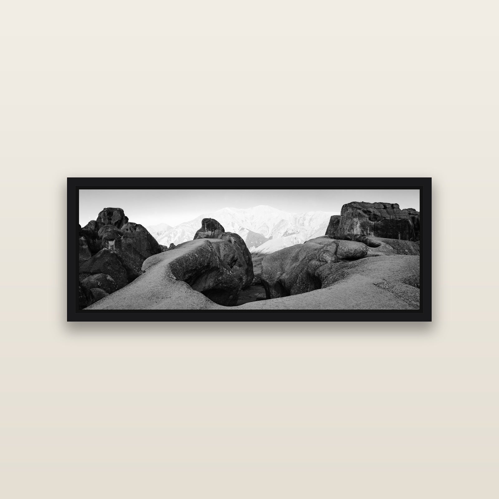 Guardians of Stone, Castle Hill — Black framed metallic canvas print, small 86 × 30 cm. New Zealand fine art landscape wall art by Stephen Milner.