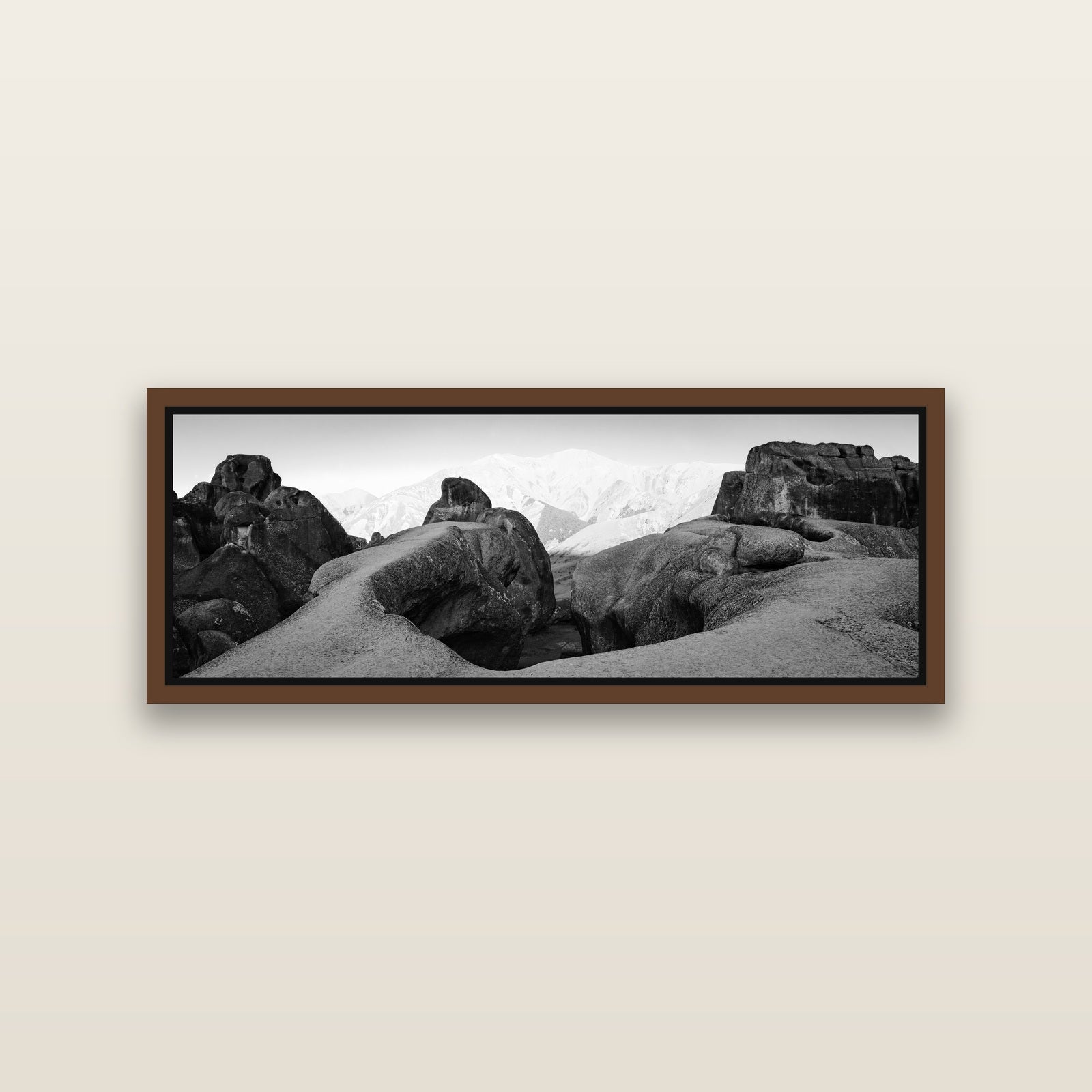 Guardians of Stone, Castle Hill — Brown framed metallic canvas print, small 86 × 30 cm. New Zealand fine art landscape wall art by Stephen Milner.