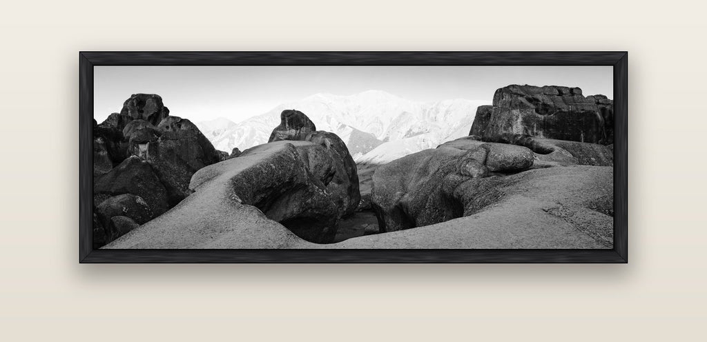 Guardians of Stone, Castle Hill — black float frame canvas, 152 × 56 cm. New Zealand fine art landscape wall art by Stephen Milner.