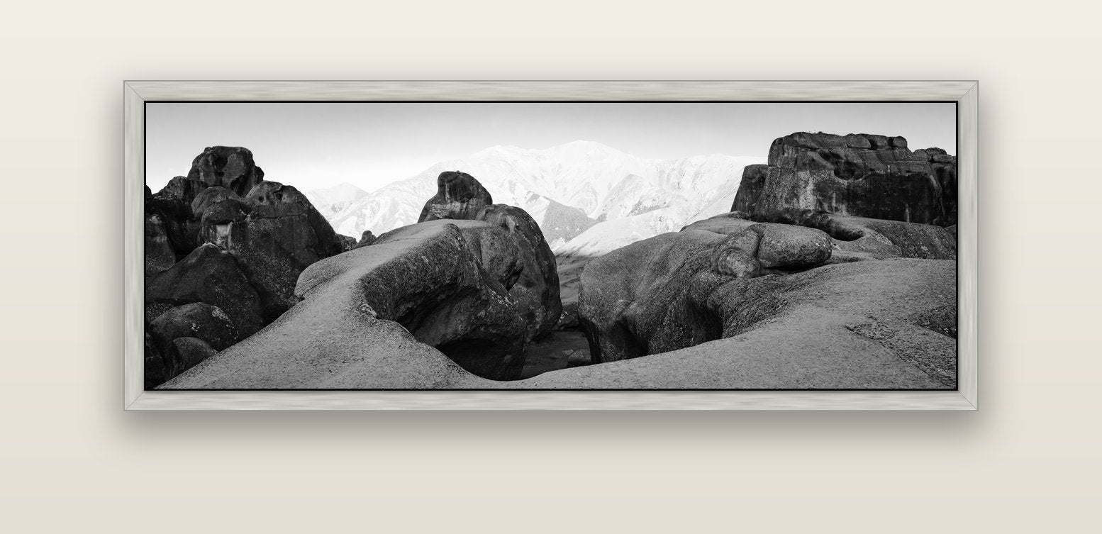 Guardians of Stone, Castle Hill — silver float frame canvas, 152 × 56 cm. New Zealand fine art landscape wall art by Stephen Milner.