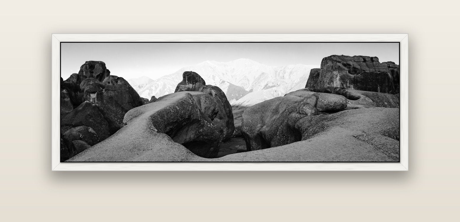 Guardians of Stone, Castle Hill — white float frame canvas, 152 × 56 cm. New Zealand fine art landscape wall art by Stephen Milner.