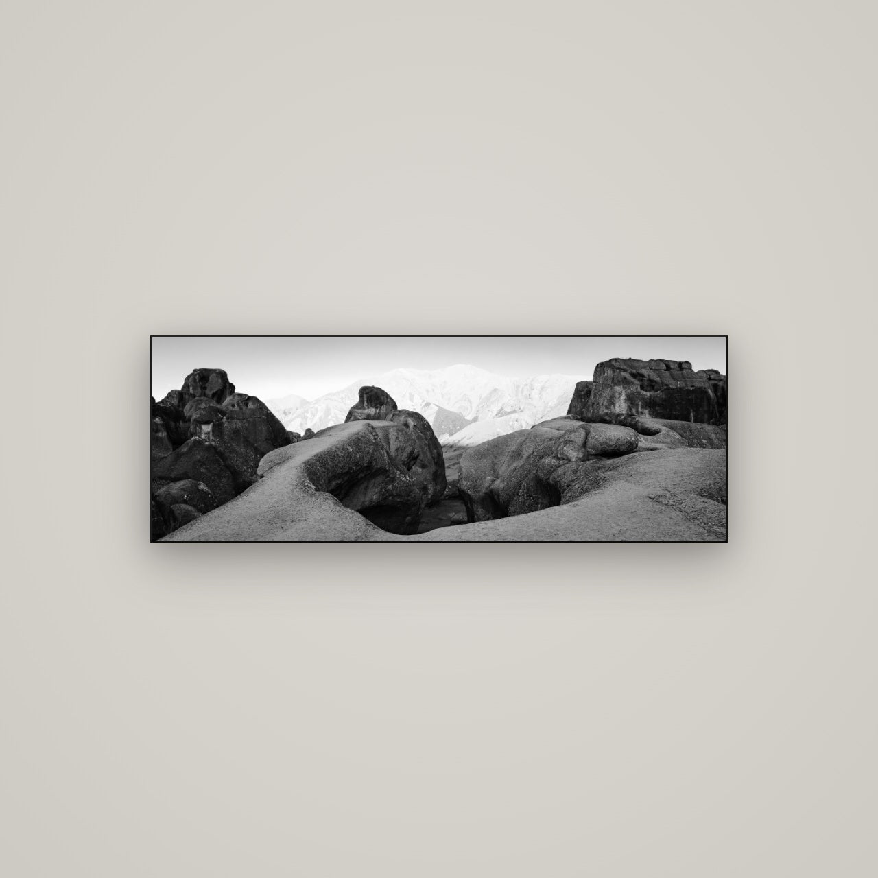 Guardians of Stone, Castle Hill — Slimline Black, 113×40 cm. New Zealand fine art wall art by Stephen Milner.