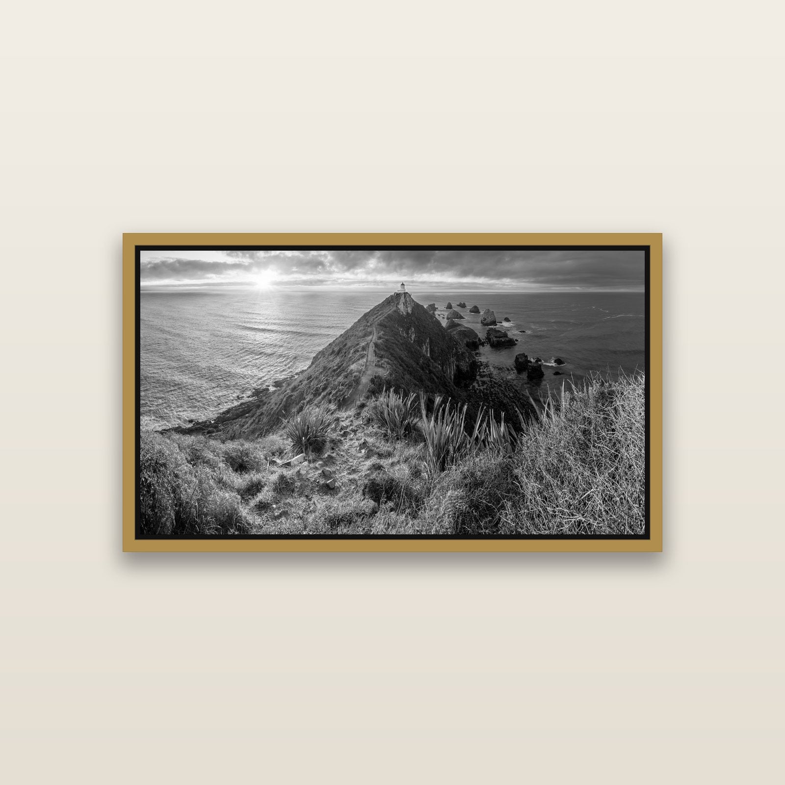Guiding Light, Nugget Point Sunrise — Antique Gold framed metallic canvas print, small 81 × 46 cm. New Zealand fine art landscape wall art by Stephen Milner.