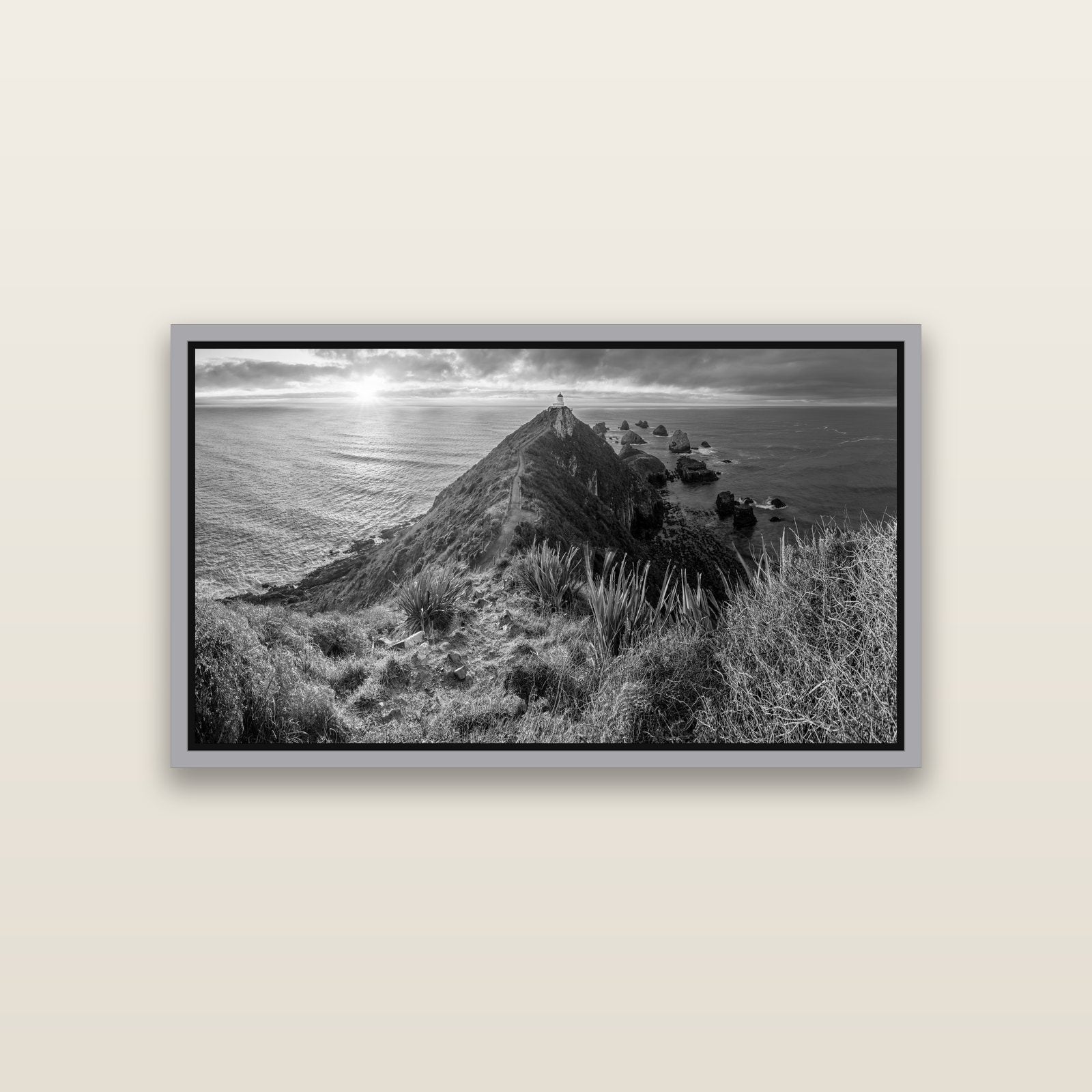 Guiding Light, Nugget Point Sunrise — Antique Silver framed metallic canvas print, small 81 × 46 cm. New Zealand fine art landscape wall art by Stephen Milner.