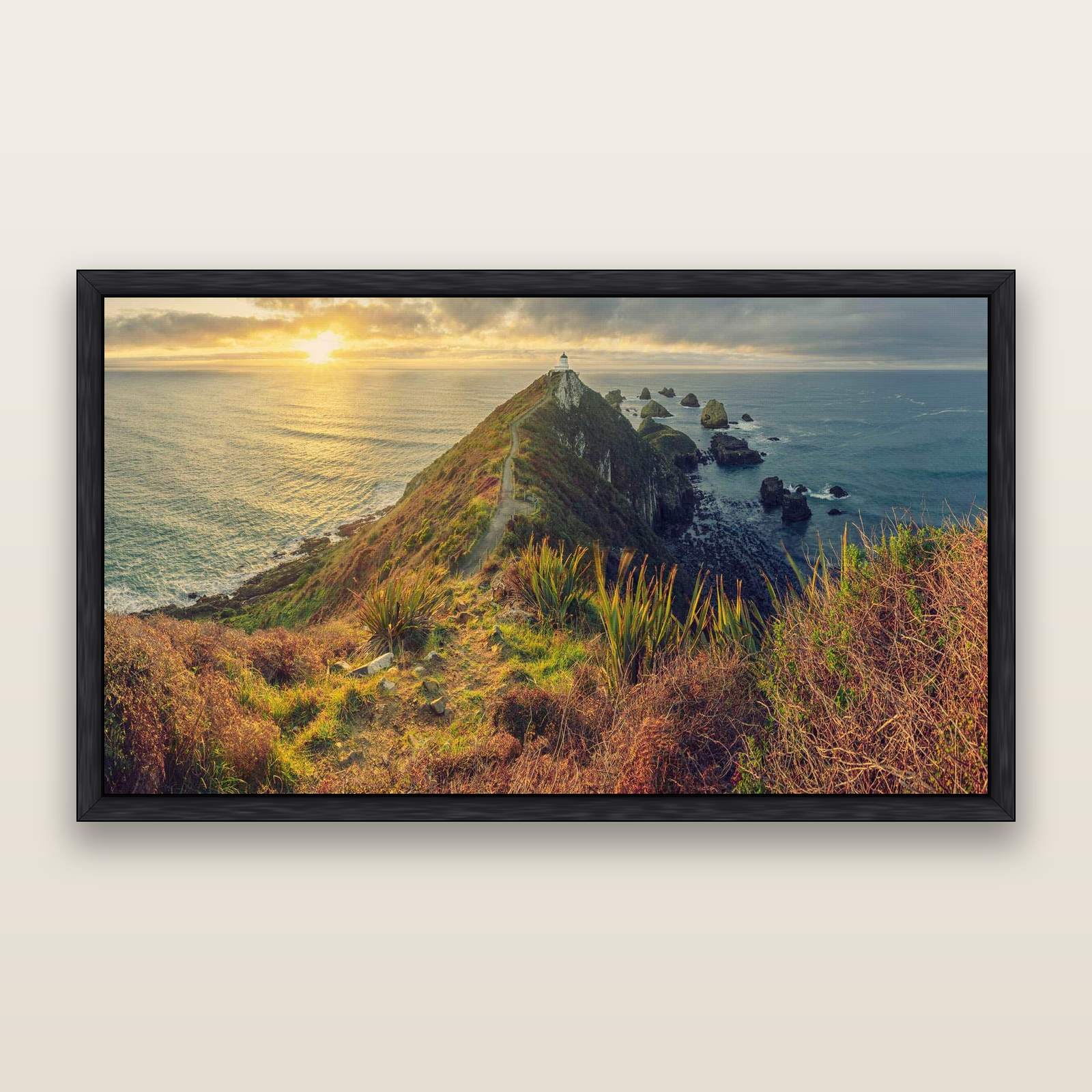 Guiding Light, Nugget Point Sunrise — framed metallic canvas print, Black frame. New Zealand fine art landscape wall art by Stephen Milner.