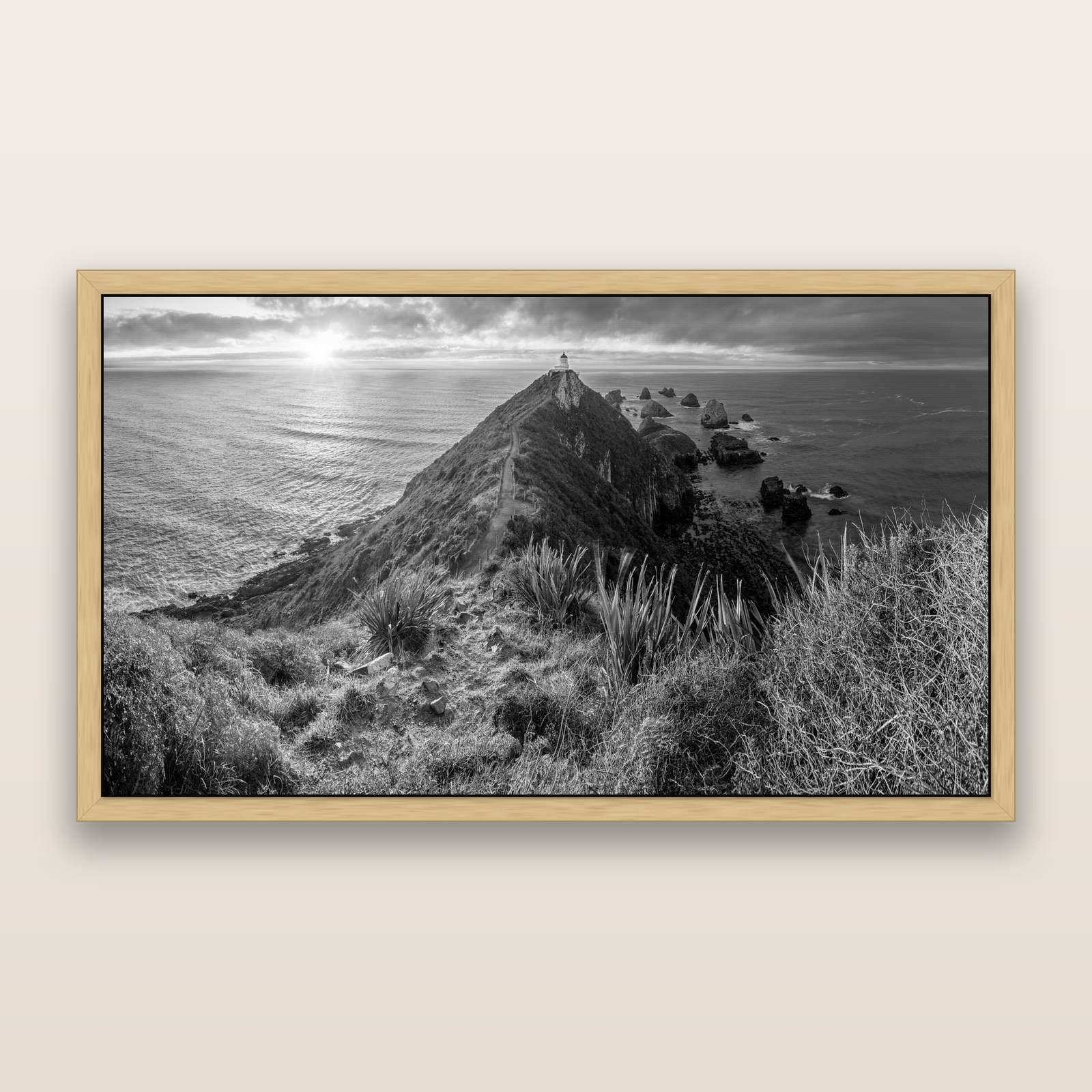 Guiding Light, Nugget Point Sunrise, black and white framed metallic canvas print, Natural frame. New Zealand fine art wall art by Stephen Milner.