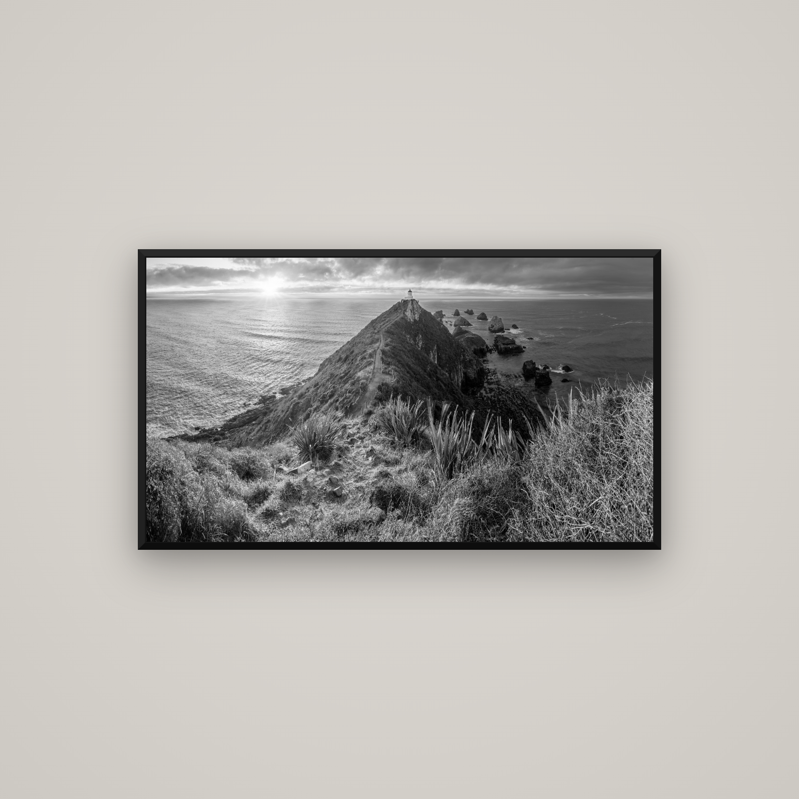 Guiding Light, Nugget Point Sunrise — Basel Black Matte, 107×60 cm. New Zealand fine art wall art by Stephen Milner.