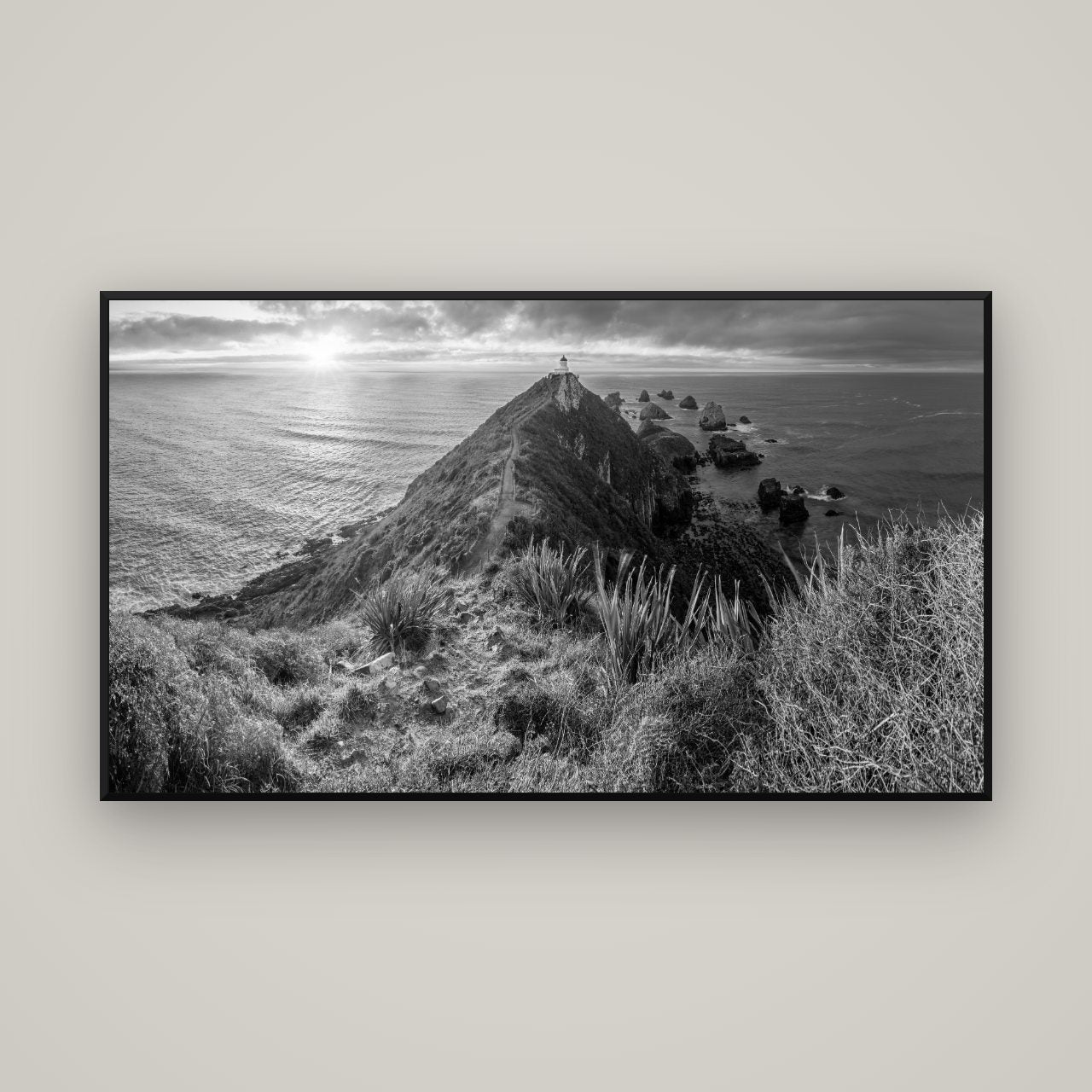 Guiding Light, Nugget Point Sunrise — Basel Black, 160×90 cm. New Zealand fine art wall art by Stephen Milner.