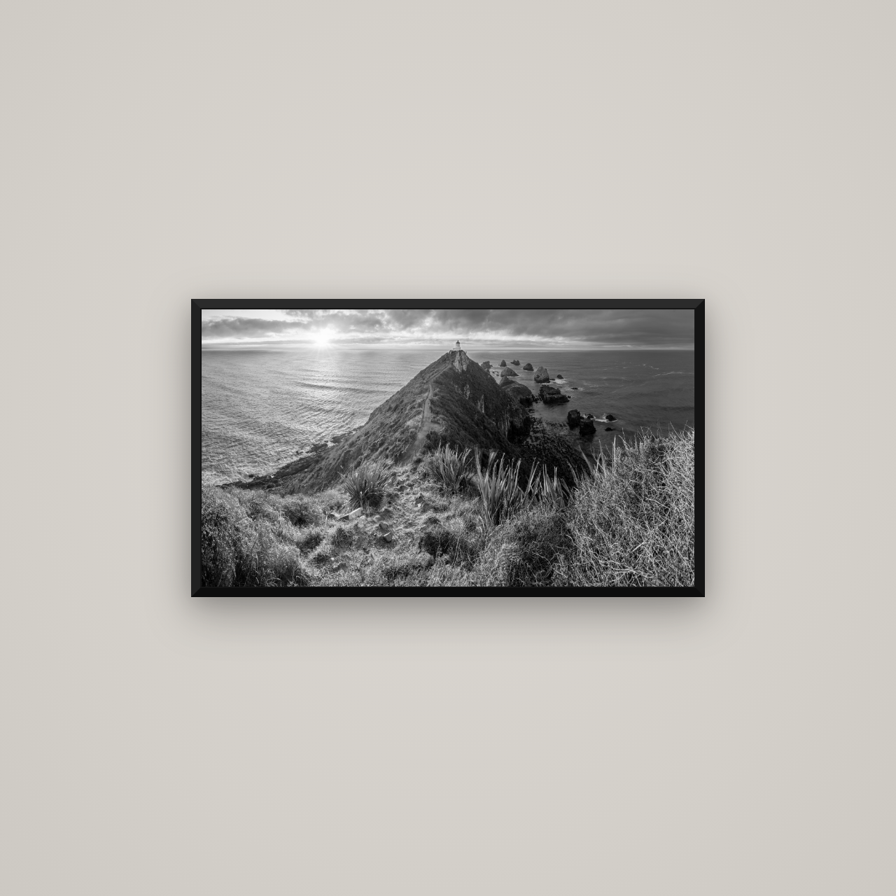 Guiding Light, Nugget Point Sunrise — Basel Black Matte, 80×45 cm. New Zealand fine art wall art by Stephen Milner.