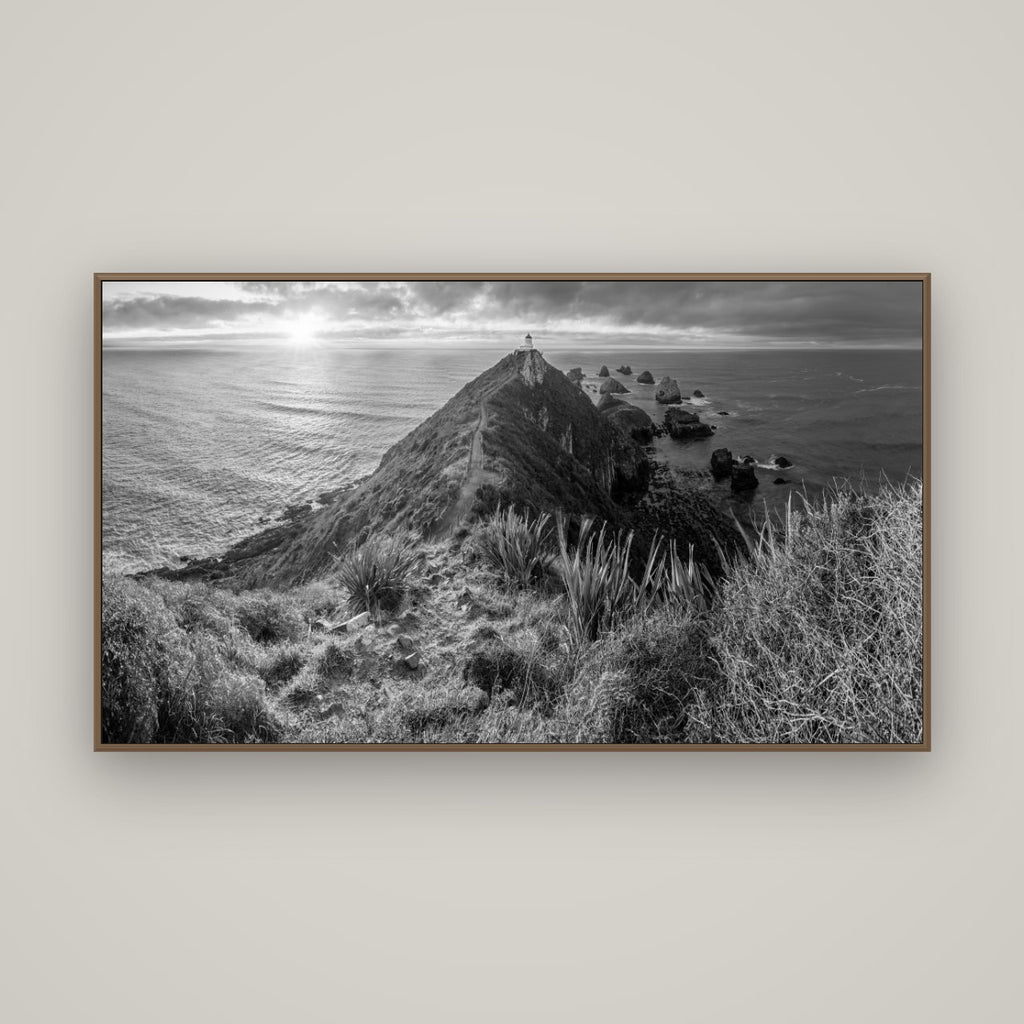 Guiding Light, Nugget Point Sunrise, Basel Walnut, 160×90 cm. New Zealand fine art wall art by Stephen Milner.