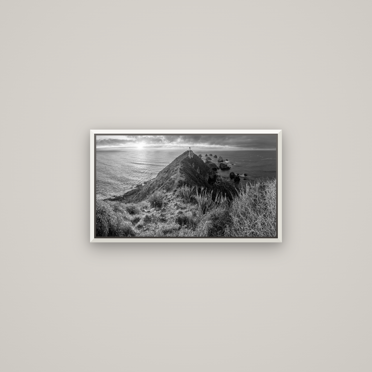 Guiding Light, Nugget Point Sunrise — Basel White, 64×36 cm. New Zealand fine art wall art by Stephen Milner.