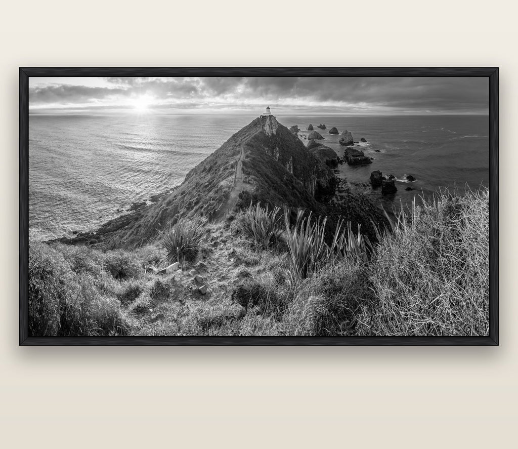 Guiding Light, Nugget Point Sunrise — black float frame canvas, 200 × 130 cm. New Zealand fine art landscape wall art by Stephen Milner.