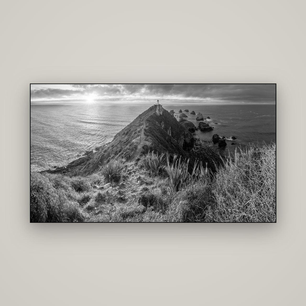 Guiding Light, Nugget Point Sunrise — Slimline Black, 160×90 cm. New Zealand fine art wall art by Stephen Milner.