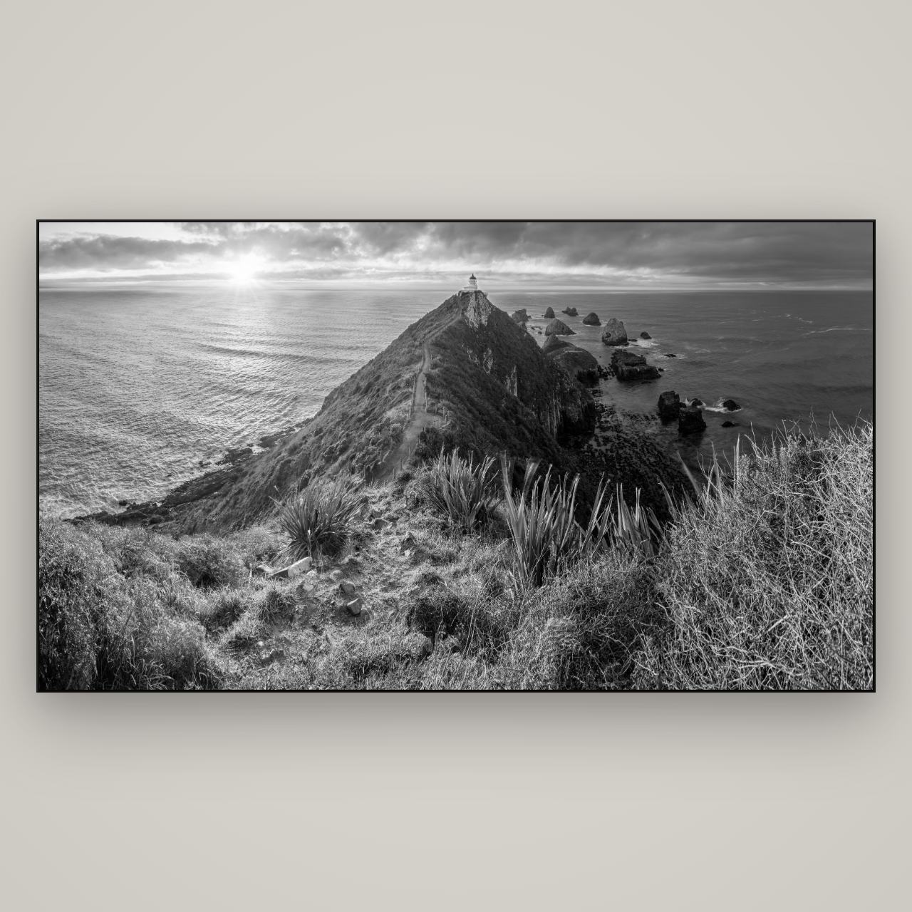 Guiding Light, Nugget Point Sunrise — Slimline Black, 196×110 cm. New Zealand fine art wall art by Stephen Milner.