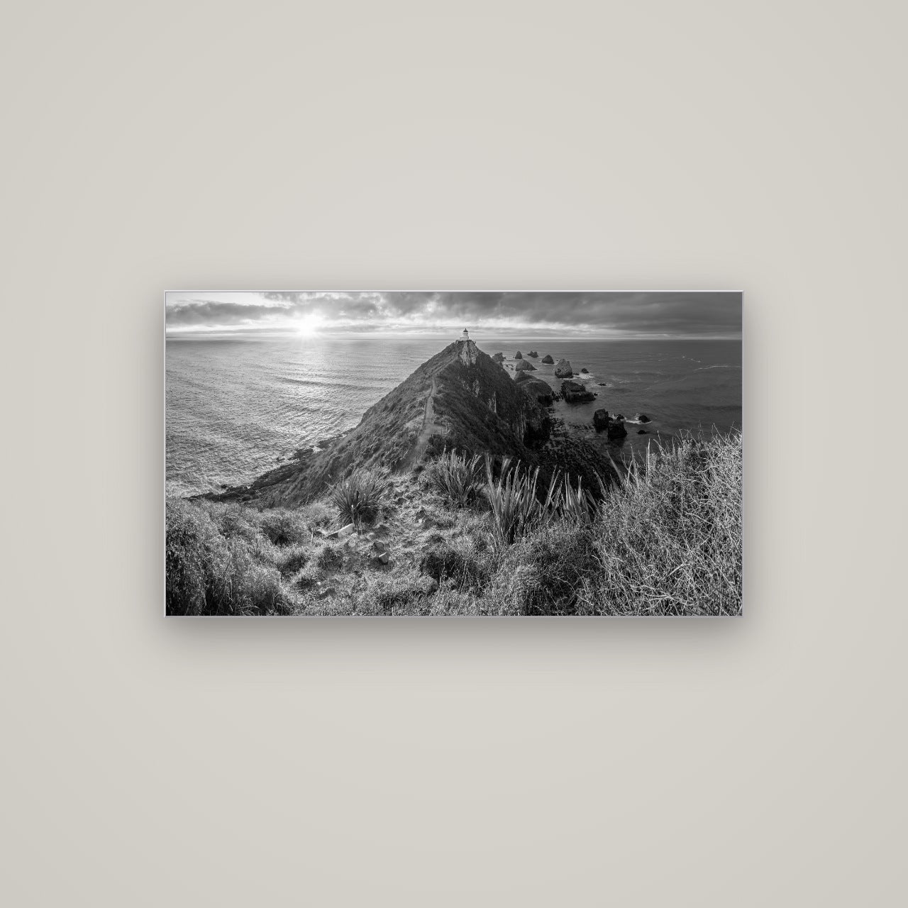 Guiding Light, Nugget Point Sunrise — Slimline Silver, 107×60 cm. New Zealand fine art wall art by Stephen Milner.