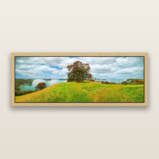 Harbour of Tranquility, Pōhutukawa Bloom at Mahurangi — framed metallic canvas print, Natural frame. New Zealand fine art landscape wall art by Stephen Milner.