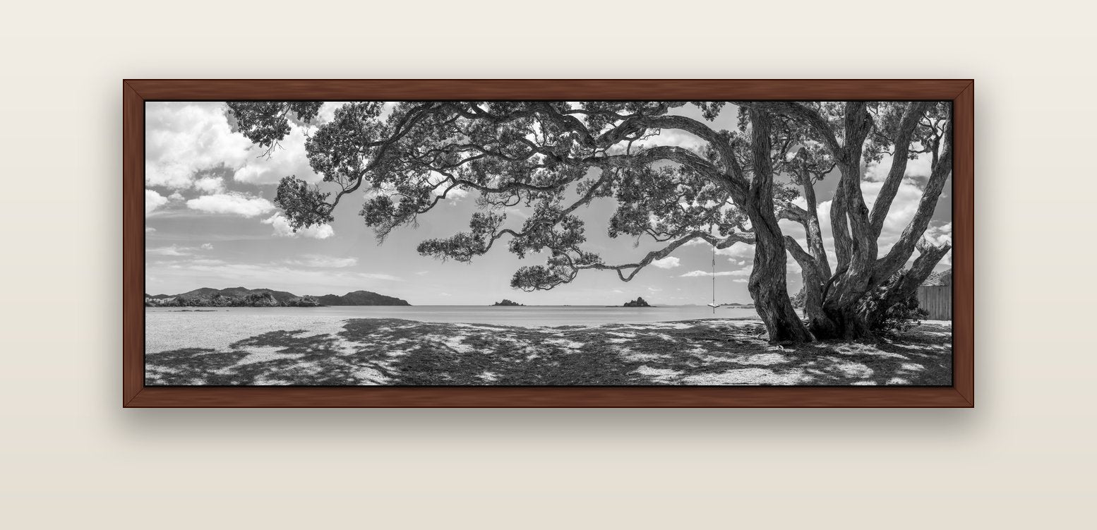 Harbour of Summer Light, Pōhutukawa Bloom, Bay of Islands — brown float frame canvas, 152 × 56 cm. New Zealand fine art landscape wall art by Stephen Milner.