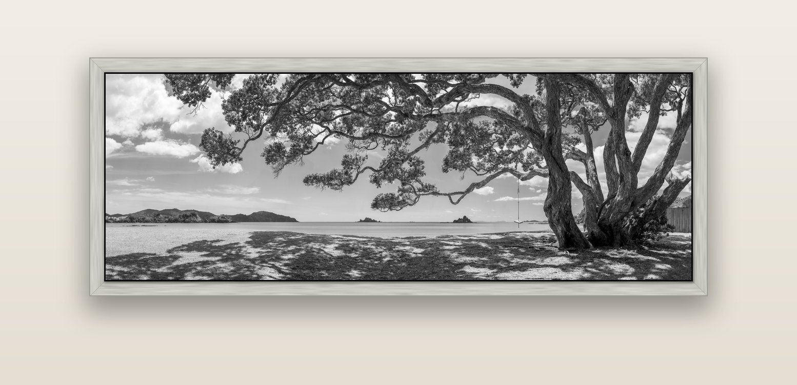Harbour of Summer Light, Pōhutukawa Bloom, Bay of Islands — silver float frame canvas, 152 × 56 cm. New Zealand fine art landscape wall art by Stephen Milner.