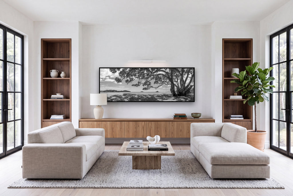 Harbour of Summer Light, Pōhutukawa Bloom, Bay of Islands shown as large black and white wall art in a styled room, fine art by Stephen Milner.