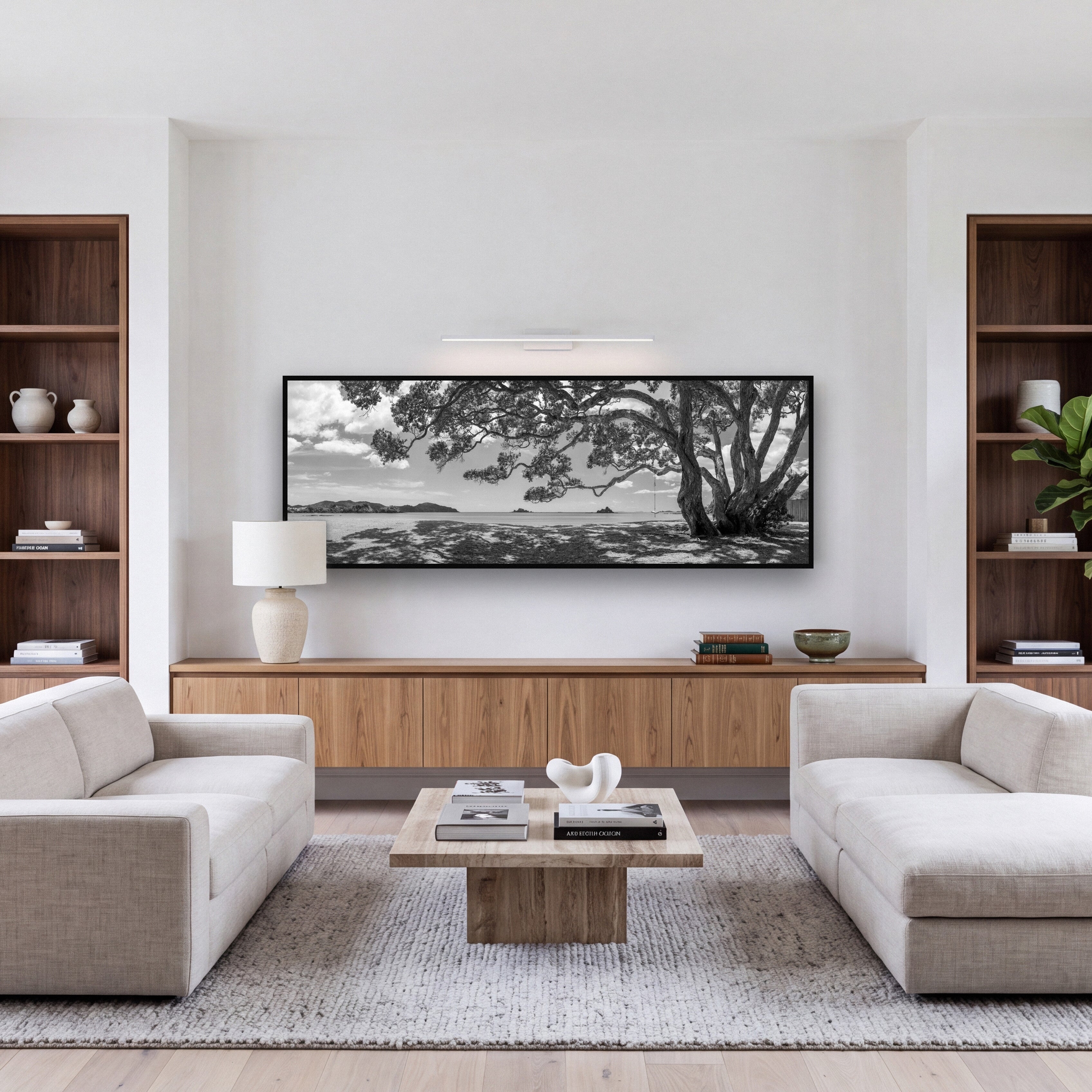 Harbour of Summer Light, Pōhutukawa Bloom, Bay of Islands shown as large black and white wall art in a styled interior. Fine art landscape photography by Stephen Milner.