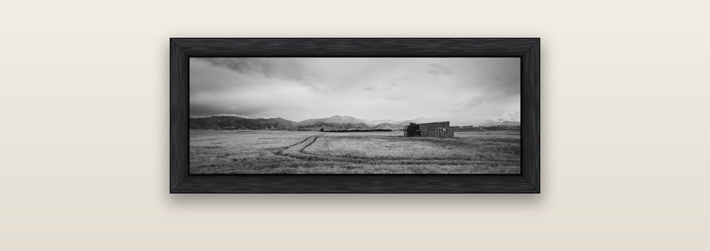 Harvest Light, Canterbury — black float frame canvas, 71 × 25 cm. New Zealand fine art landscape wall art by Stephen Milner.