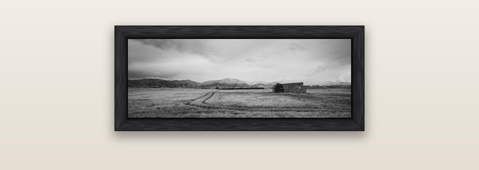 Harvest Light, Canterbury — black float frame canvas, 71 × 25 cm. New Zealand fine art landscape wall art by Stephen Milner.