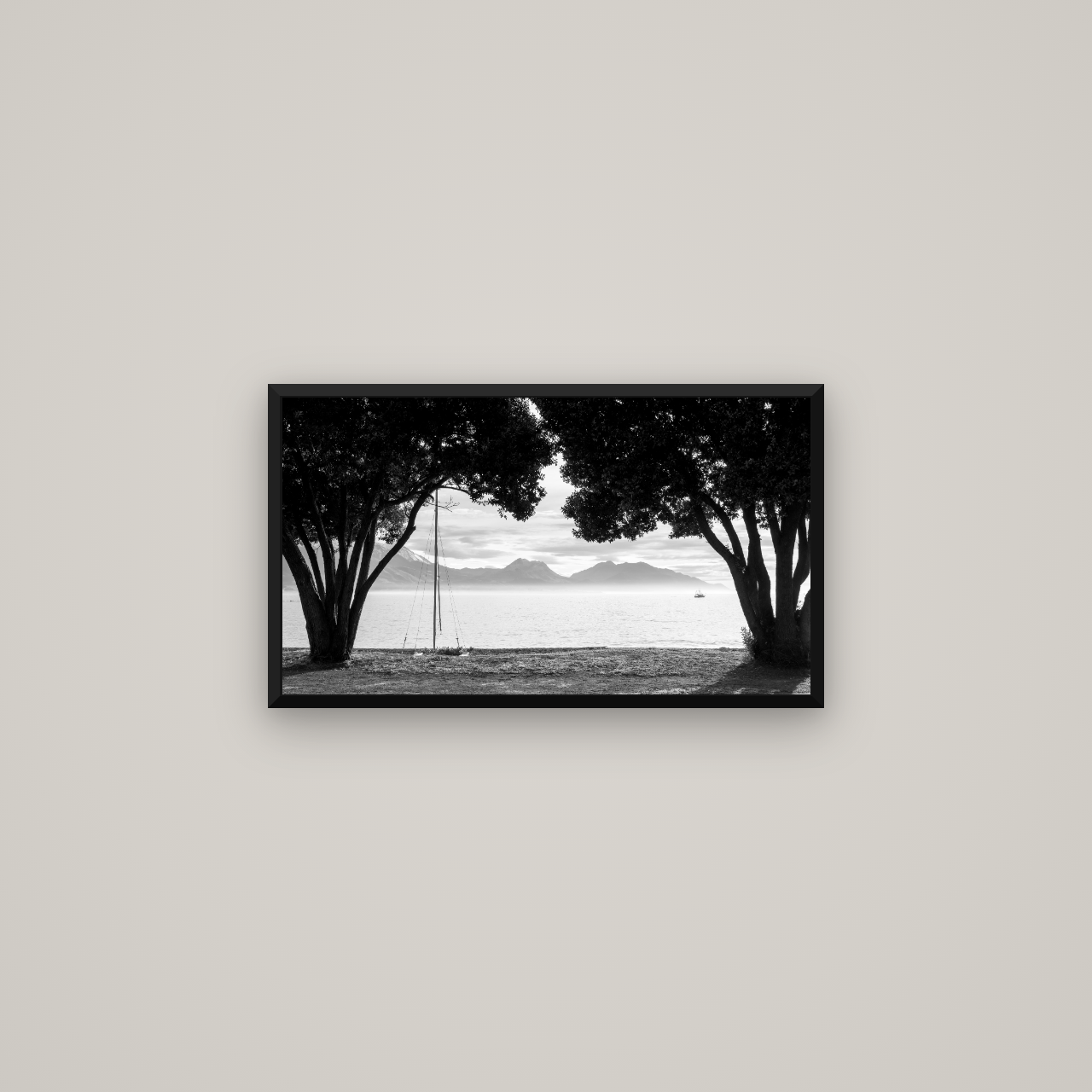 Kaikōura's Coastal Embrace — Basel Black Matte, 64×36 cm. New Zealand fine art wall art by Stephen Milner.