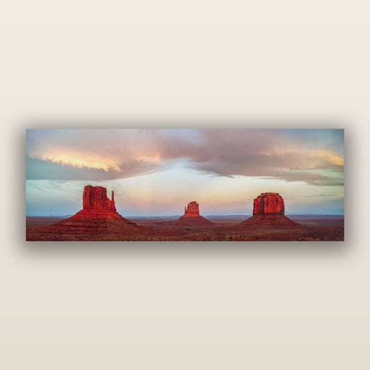 Majestic Guardians, Monument Valley Sunset Spectacle — frameless acrylic glass print. New Zealand fine art landscape photography by Stephen Milner.