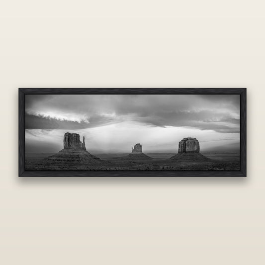 Majestic Guardians, Monument Valley Sunset Spectacle, black and white framed metallic canvas print, Black frame. New Zealand fine art wall art by Stephen Milner.