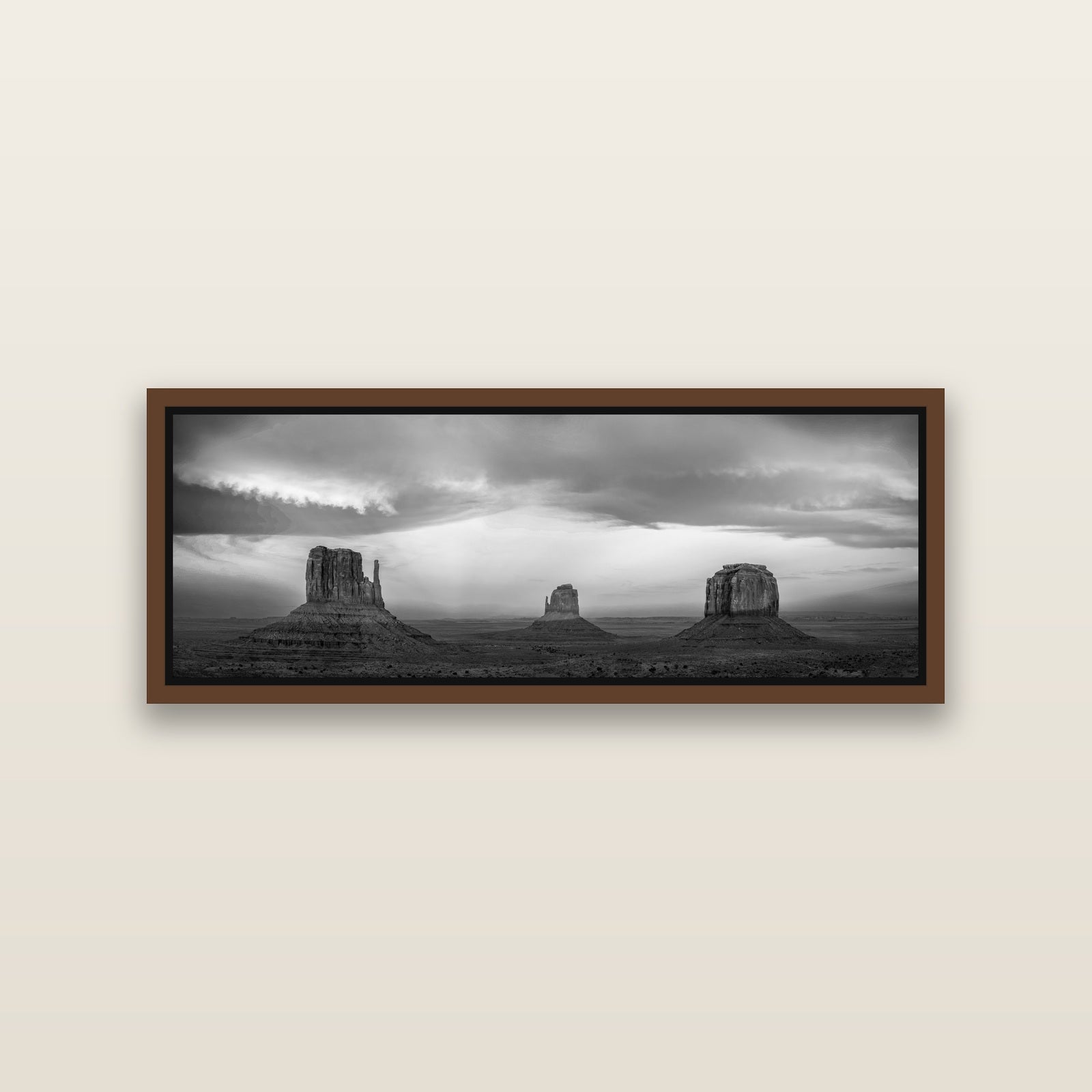 Majestic Guardians, Monument Valley Sunset Spectacle — Brown framed metallic canvas print, small 86 × 30 cm. New Zealand fine art landscape wall art by Stephen Milner.