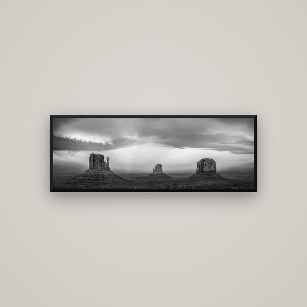 Majestic Guardians, Monument Valley Sunset Spectacle — Basel Black Matte, 113×40 cm. New Zealand fine art wall art by Stephen Milner.