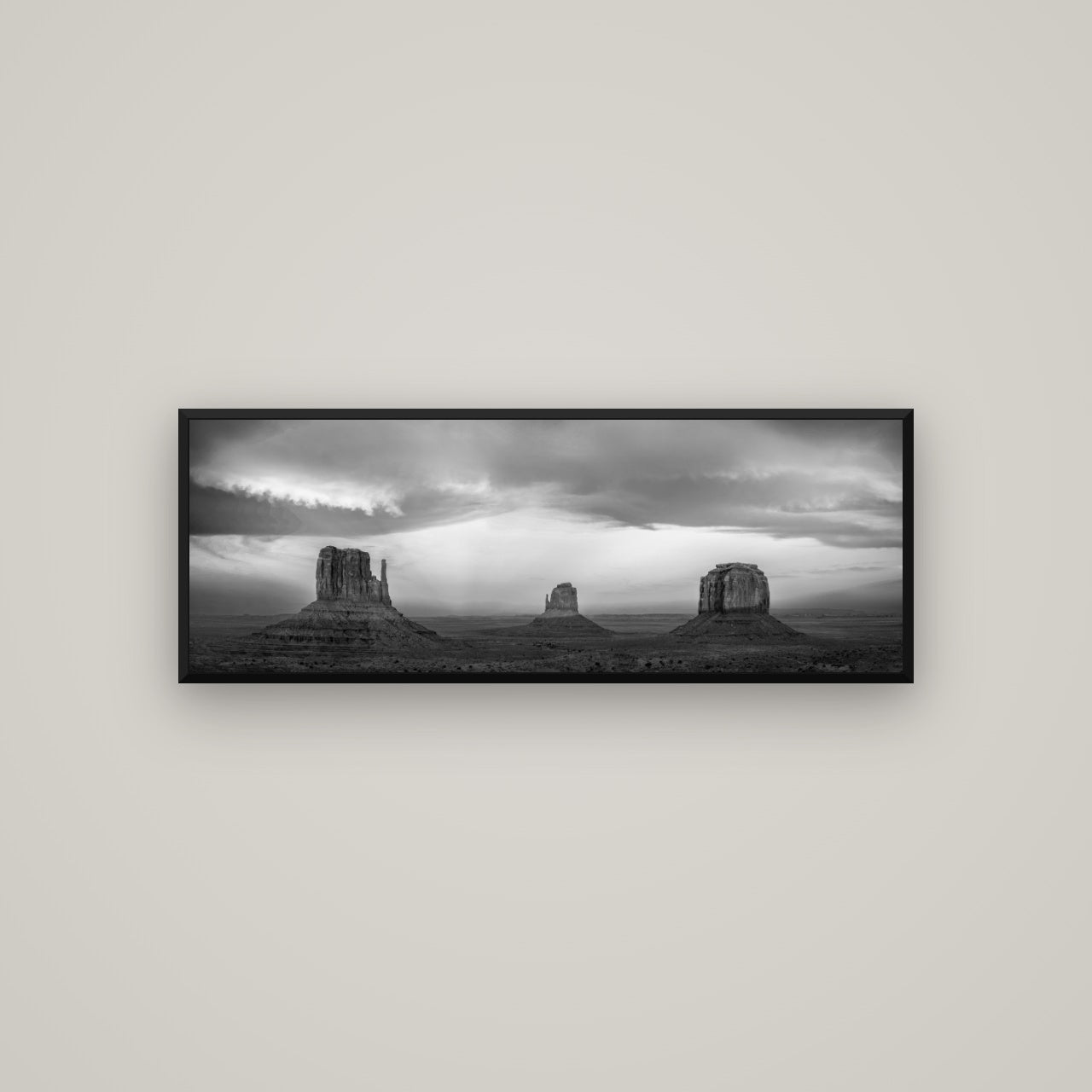 Majestic Guardians, Monument Valley Sunset Spectacle — Basel Black, 113×40 cm. New Zealand fine art wall art by Stephen Milner.