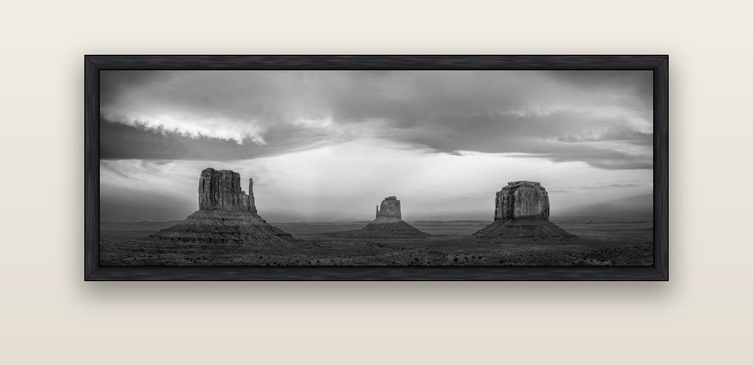 Majestic Guardians, Monument Valley Sunset Spectacle — black float frame canvas, 152 × 56 cm. New Zealand fine art landscape wall art by Stephen Milner.