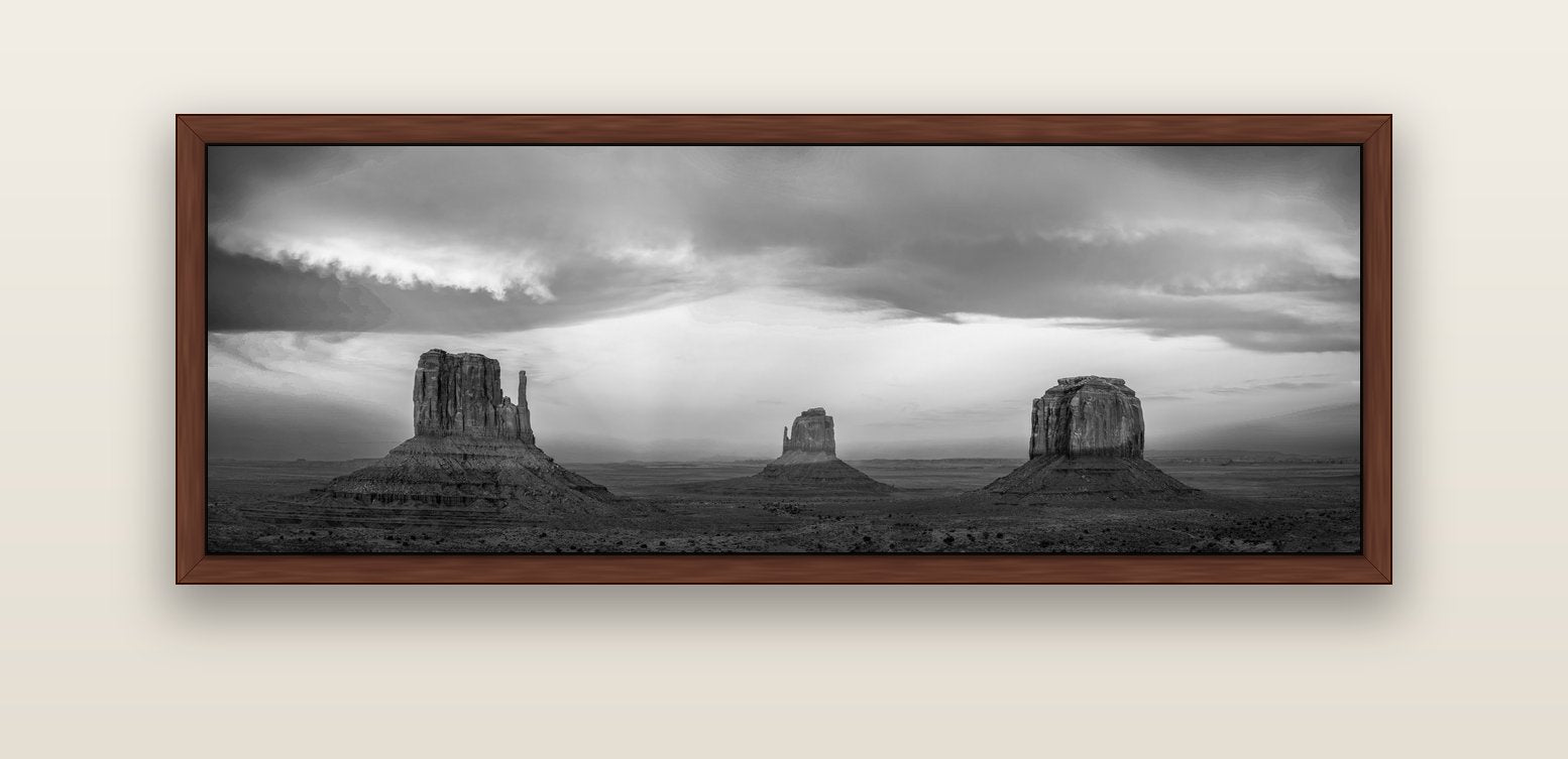 Majestic Guardians, Monument Valley Sunset Spectacle — brown float frame canvas, 152 × 56 cm. New Zealand fine art landscape wall art by Stephen Milner.