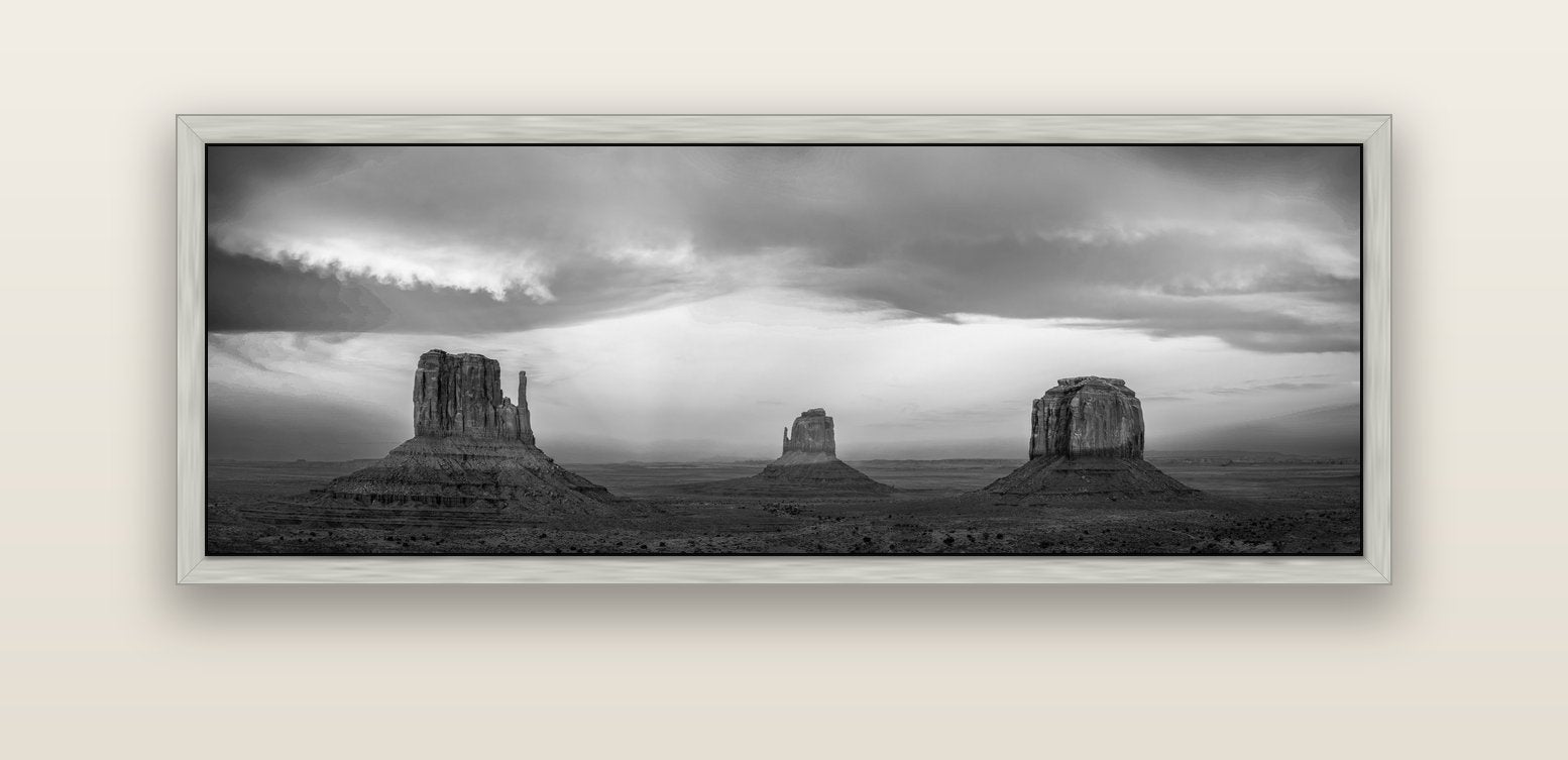 Majestic Guardians, Monument Valley Sunset Spectacle — silver float frame canvas, 152 × 56 cm. New Zealand fine art landscape wall art by Stephen Milner.