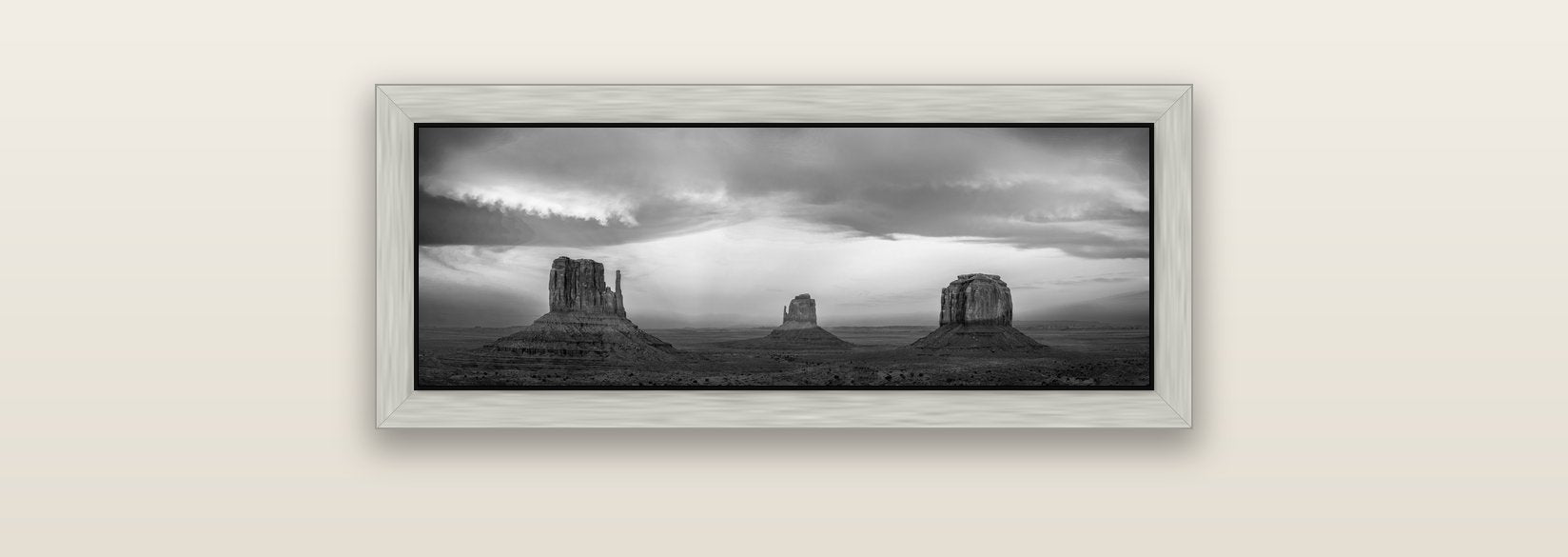 Majestic Guardians, Monument Valley Sunset Spectacle — silver float frame canvas, 71 × 25 cm. New Zealand fine art landscape wall art by Stephen Milner.