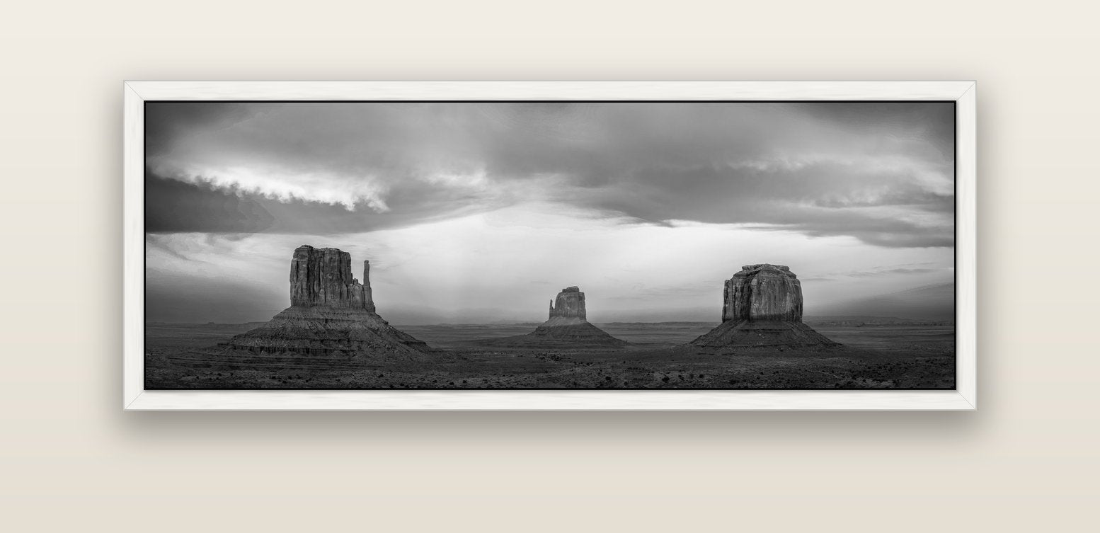 Majestic Guardians, Monument Valley Sunset Spectacle — white float frame canvas, 152 × 56 cm. New Zealand fine art landscape wall art by Stephen Milner.