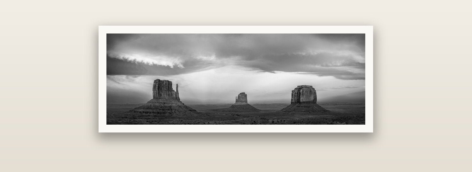 Majestic Guardians, Monument Valley Sunset Spectacle — Hahnemühle fine art print, 90 × 30 cm. New Zealand fine art landscape photography by Stephen Milner.