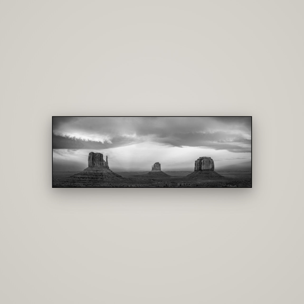 Majestic Guardians, Monument Valley Sunset Spectacle — Slimline Black, 113×40 cm. New Zealand fine art wall art by Stephen Milner.