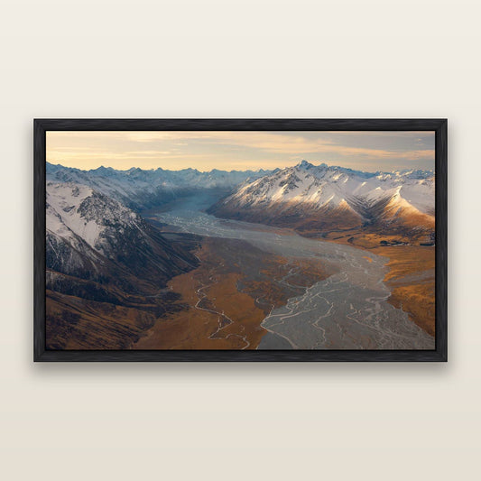 Majestic Solitude, Godley Valley's Embrace — framed metallic canvas print, Black frame. New Zealand fine art landscape wall art by Stephen Milner.