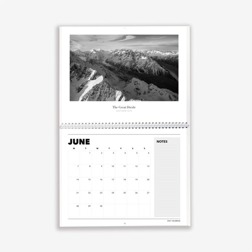 2027 calendar open at June, The Great Divide above the date page.