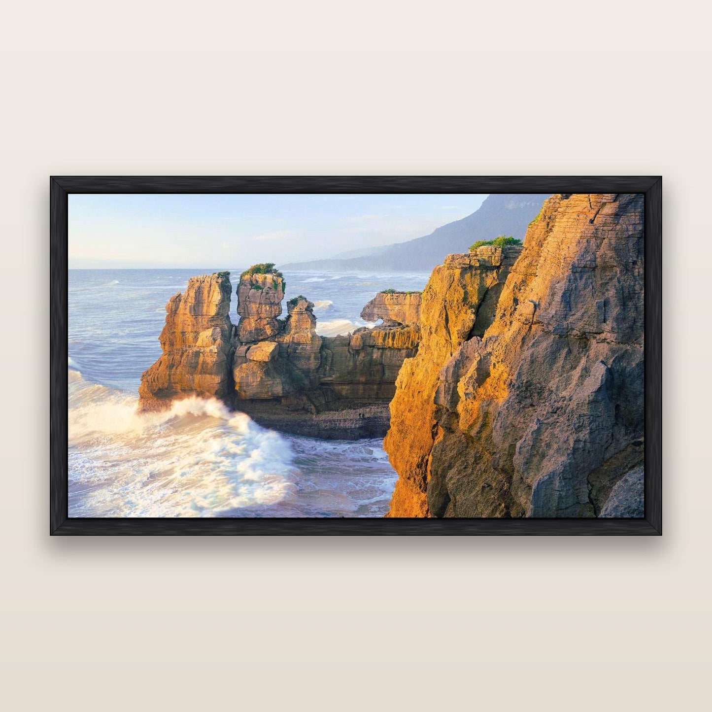 Punakaiki Sculptures, South Island — framed metallic canvas print, Black frame. New Zealand fine art landscape wall art by Stephen Milner.