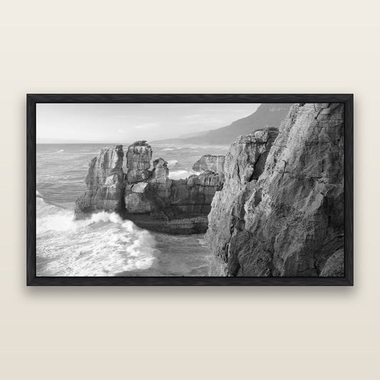 Punakaiki Sculptures, South Island, black and white framed metallic canvas print, Black frame. New Zealand fine art wall art by Stephen Milner.