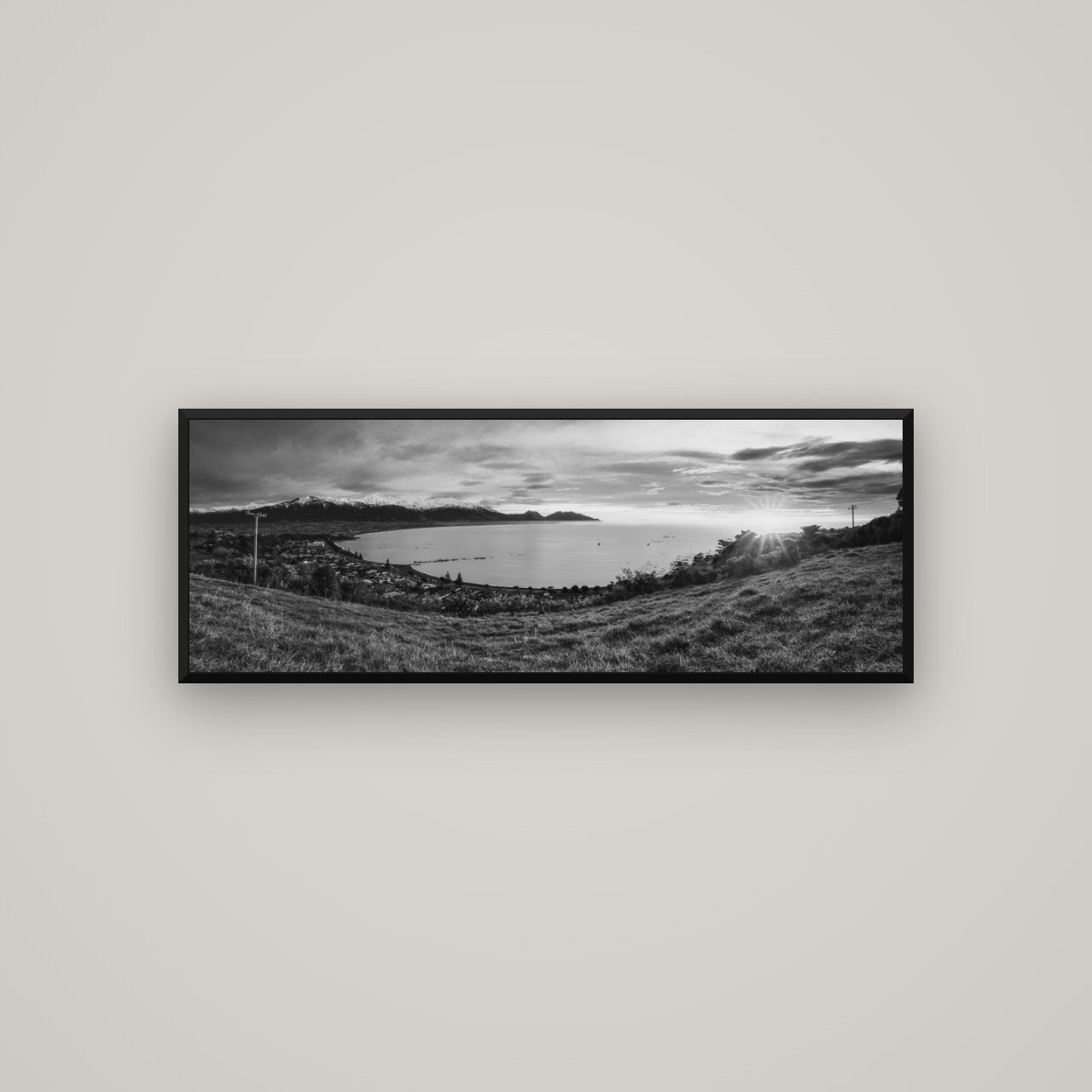 Radiant Awakening, Kaikōura's Coastal Majesty — Basel Black, 113×40 cm. New Zealand fine art wall art by Stephen Milner.