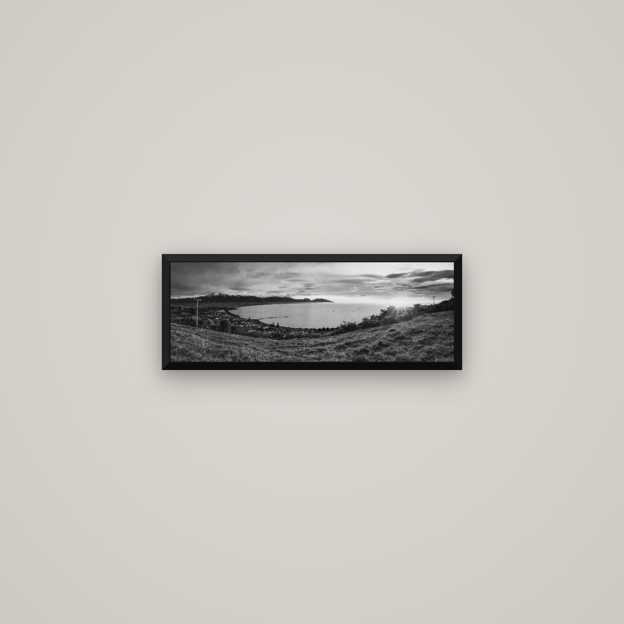 Radiant Awakening, Kaikōura's Coastal Majesty — Basel Black Matte, 57×20 cm. New Zealand fine art wall art by Stephen Milner.