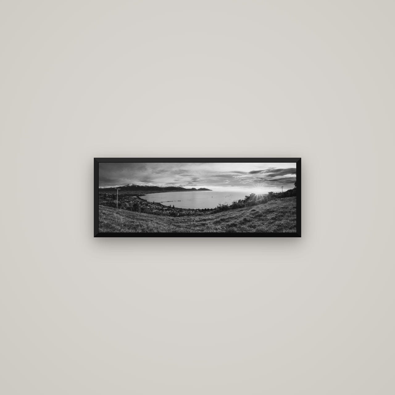 Radiant Awakening, Kaikōura's Coastal Majesty — Basel Black Matte, 68×24 cm. New Zealand fine art wall art by Stephen Milner.