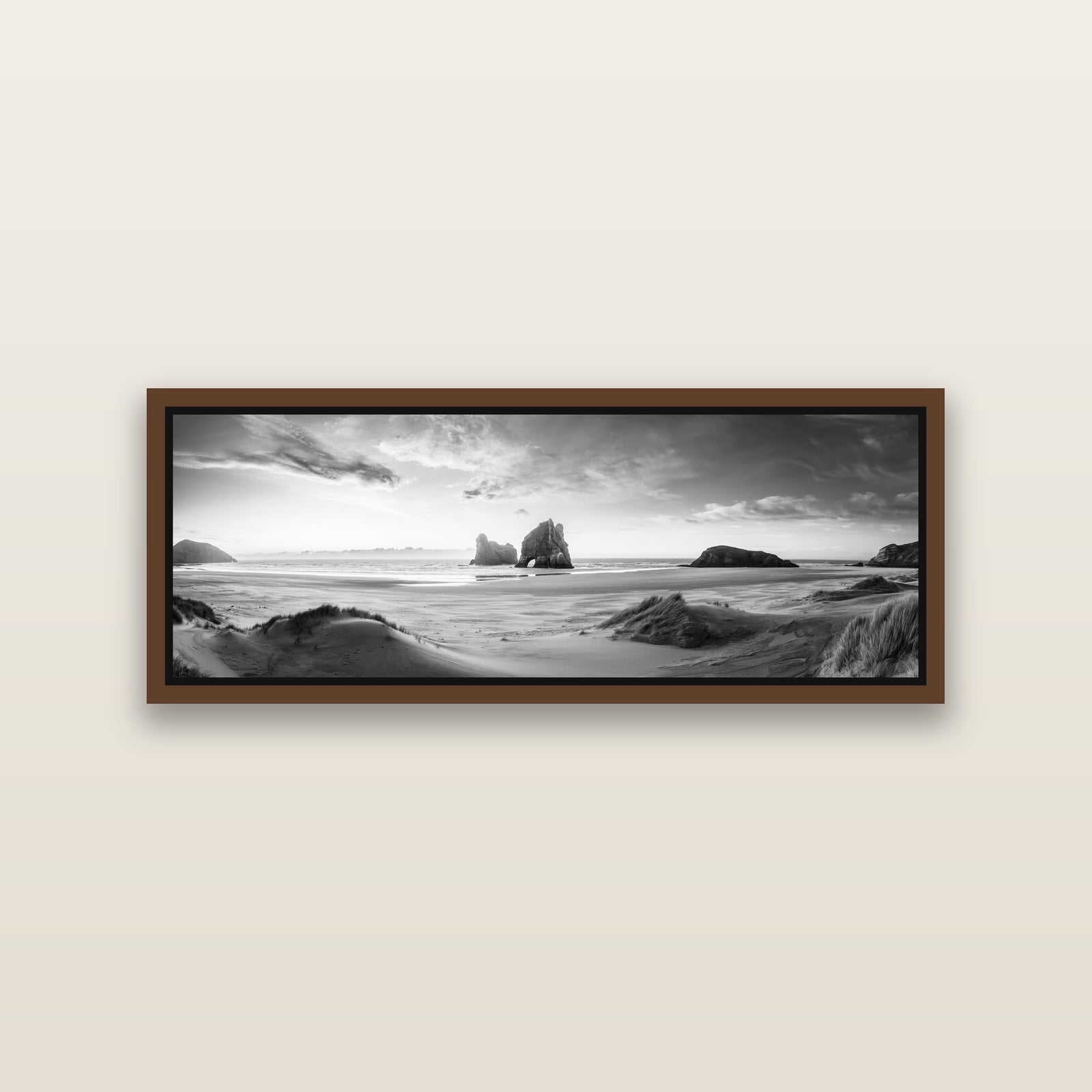 Sands of Time, Wharariki Beach — Brown framed metallic canvas print, small 86 × 30 cm. New Zealand fine art landscape wall art by Stephen Milner.