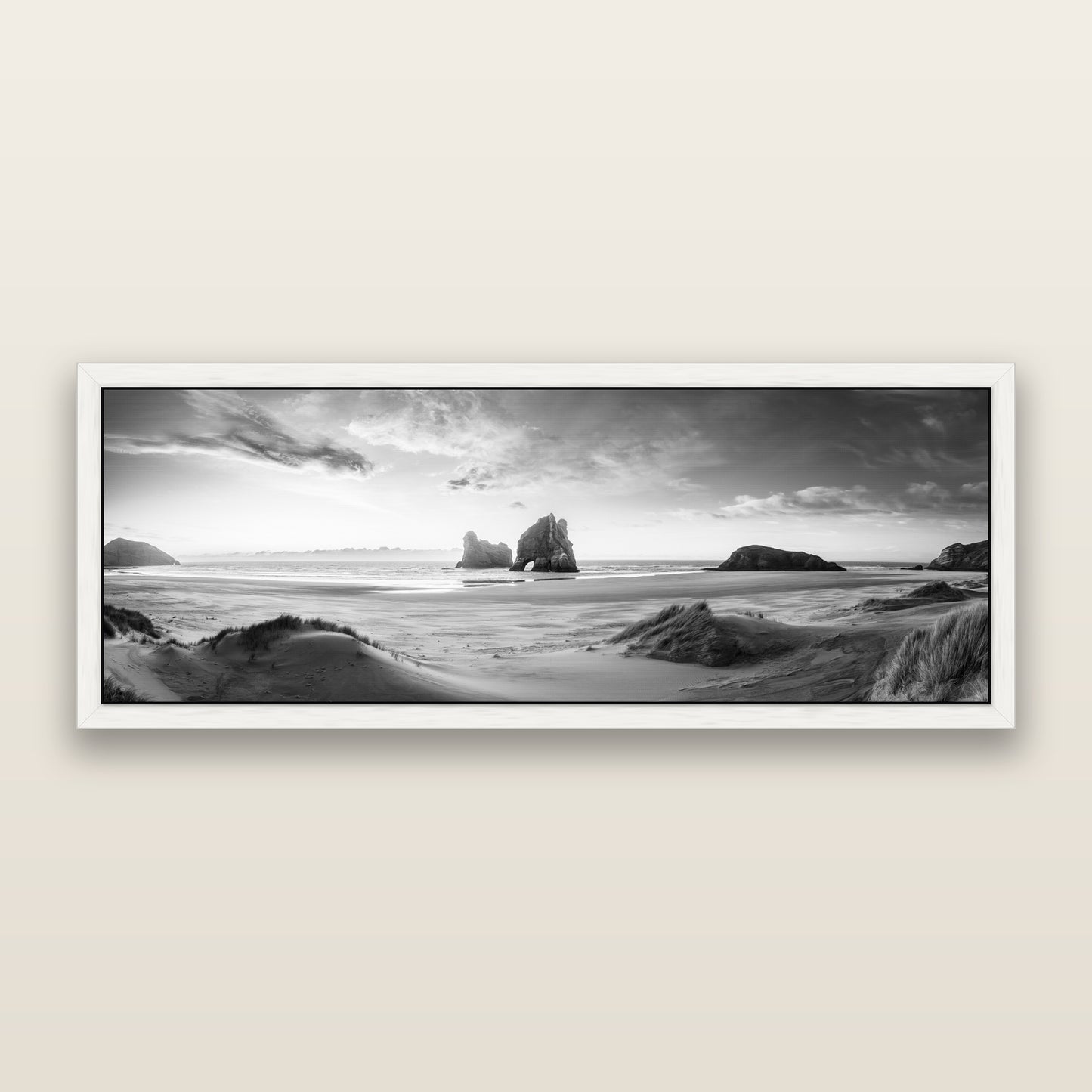 Sands of Time, Wharariki Beach — black and white framed metallic canvas print, White frame. New Zealand fine art wall art by Stephen Milner.