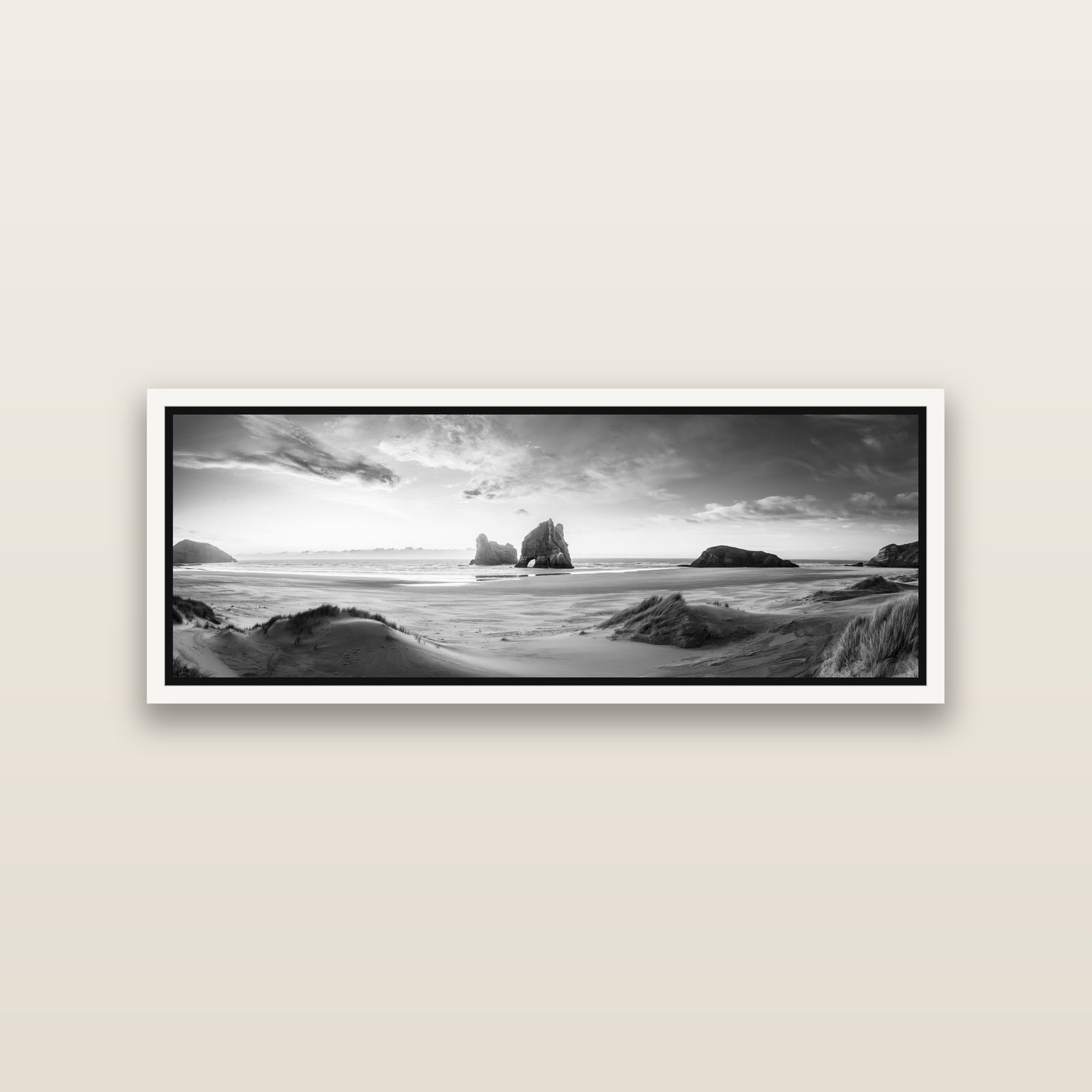 Sands of Time, Wharariki Beach — White framed metallic canvas print, small 86 × 30 cm. New Zealand fine art landscape wall art by Stephen Milner.