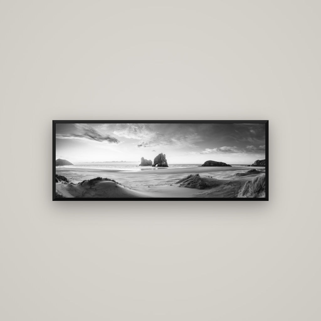 Sands of Time, Wharariki Beach — Basel Black Matte, 113×40 cm. New Zealand fine art wall art by Stephen Milner.